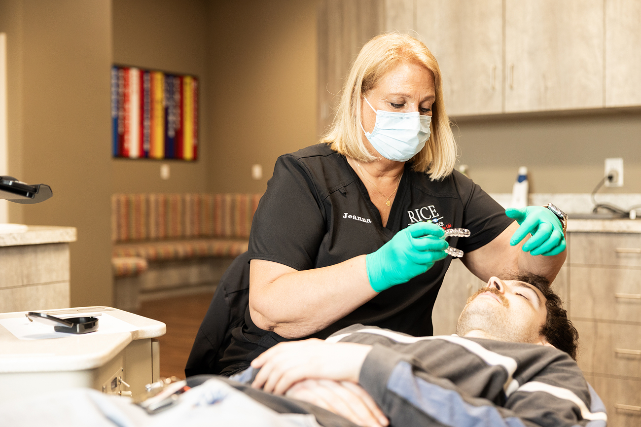 Team member working with patient